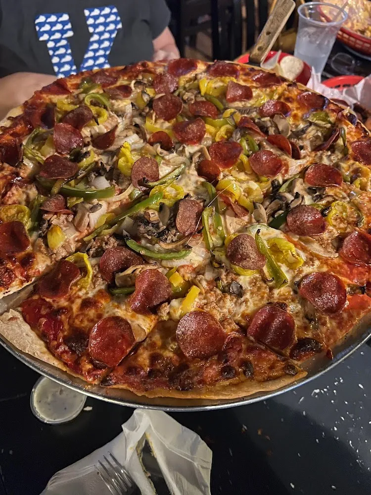The Deluxe Pizza